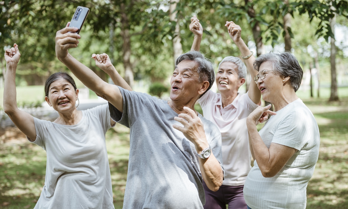 seniors with spirit: chinese retirees dancing and sharing live online