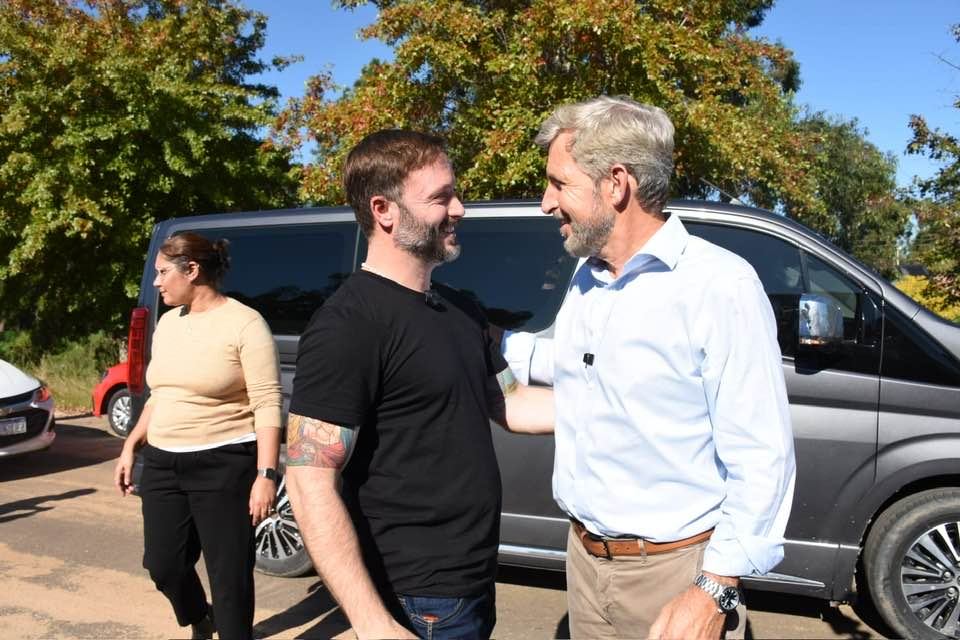 azcué y frigerio sonrientes