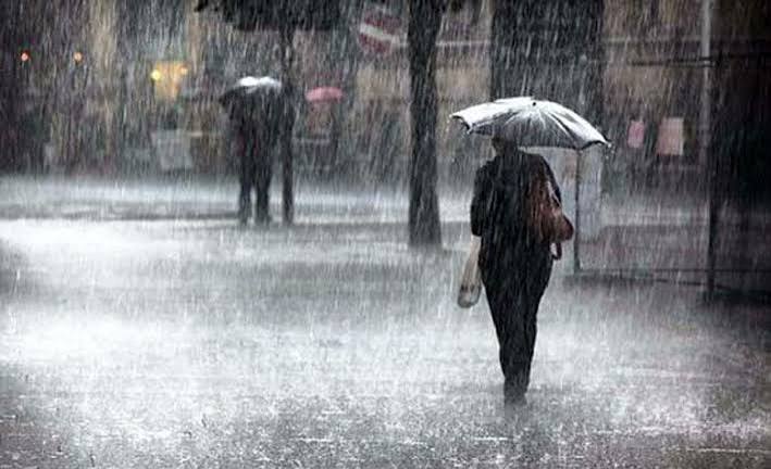 lluvias paraguas abrigo